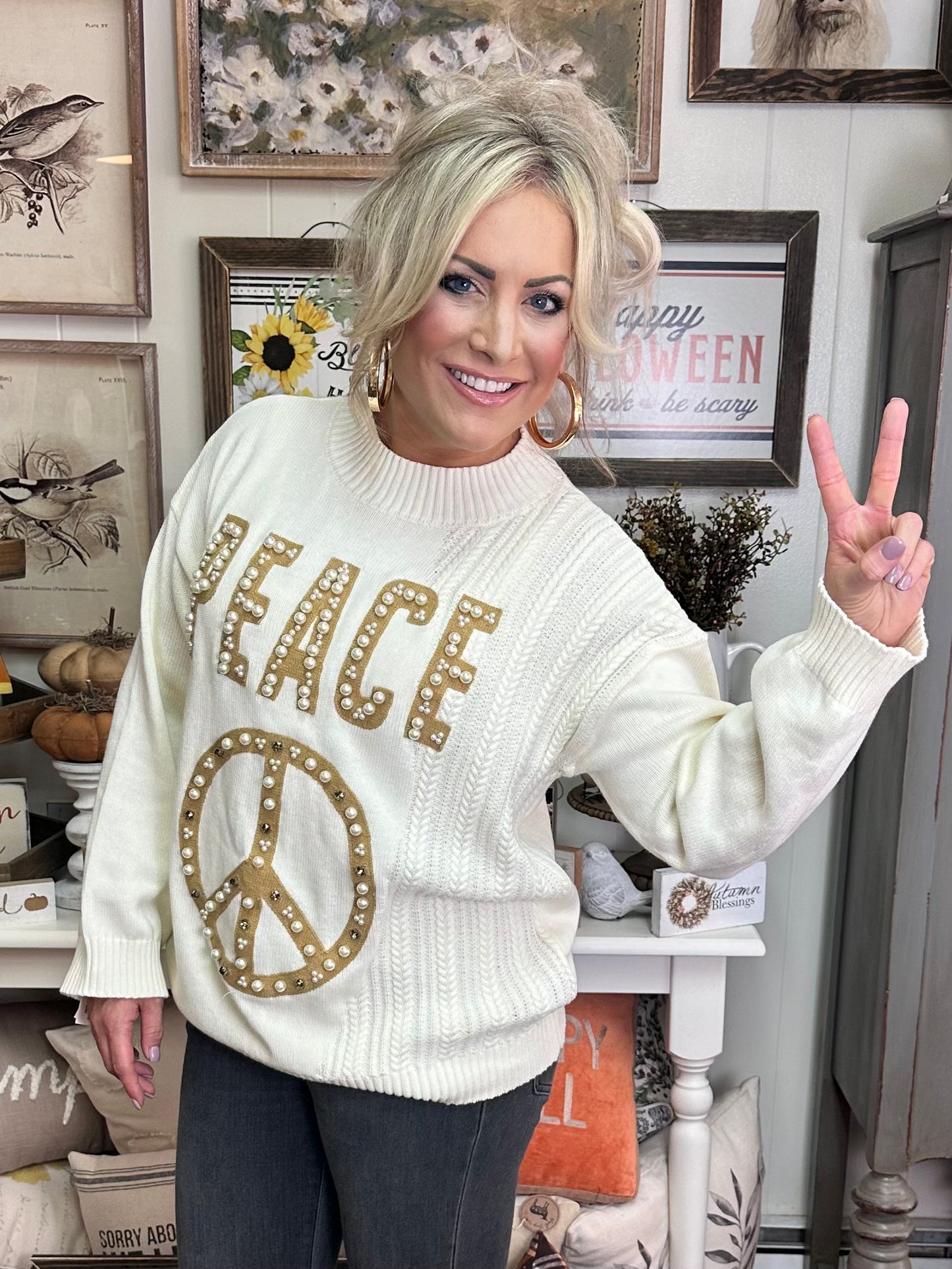 Cream peace sweater